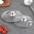 Couvercles en verre trempé cerclés d'inox, avec bouton en inox