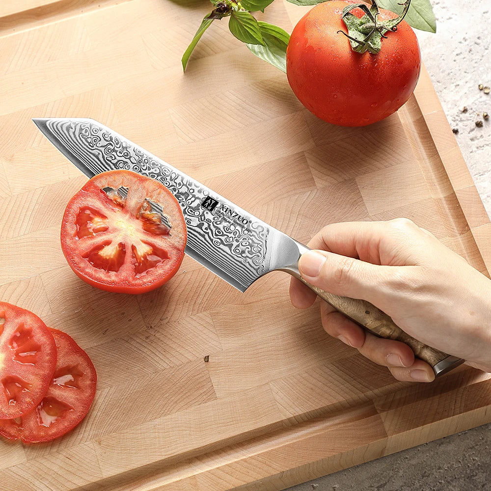 Petit bunka Damas XINZUO tranchant une tomate