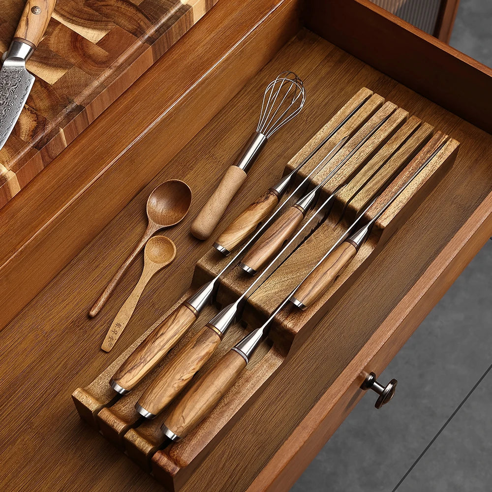 Range-couteaux XINZUO en acacia dans un tiroir de cuisine