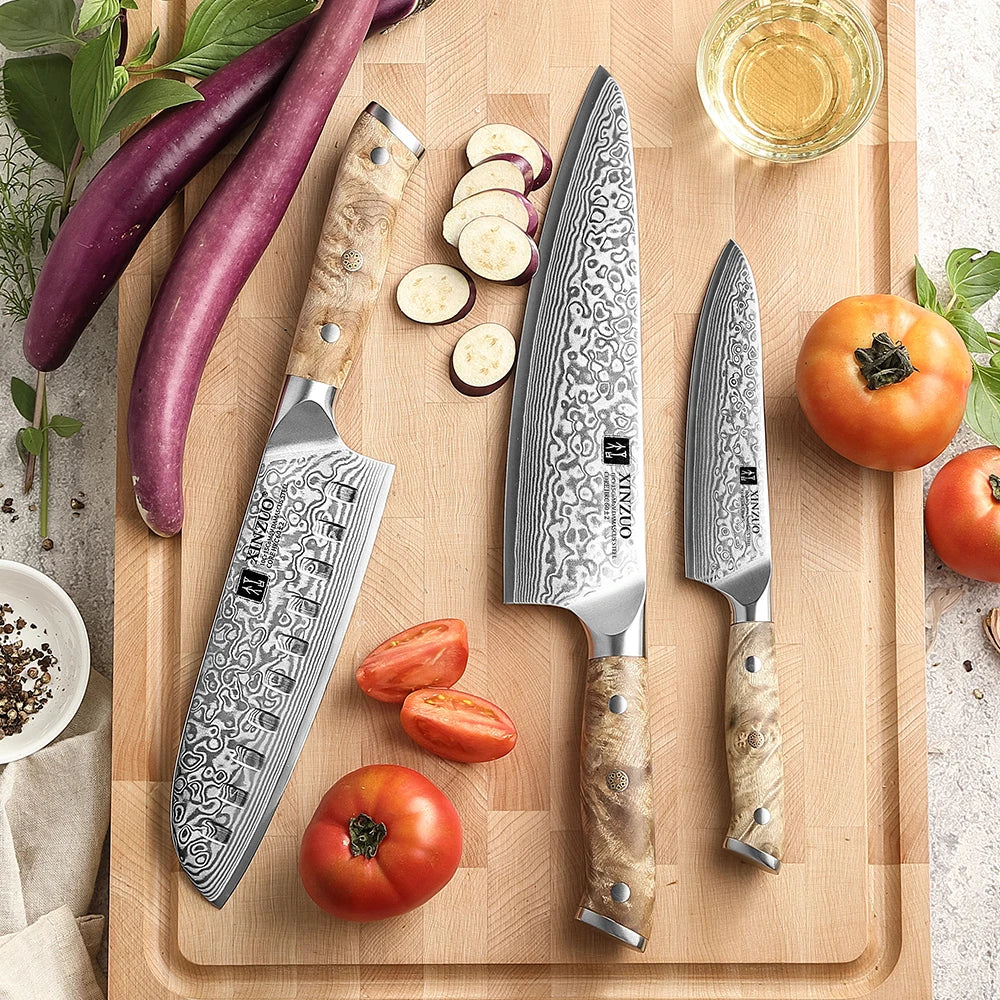 Santoku XINZUO en acier damassé à lame alvéolée, manche en sycomore